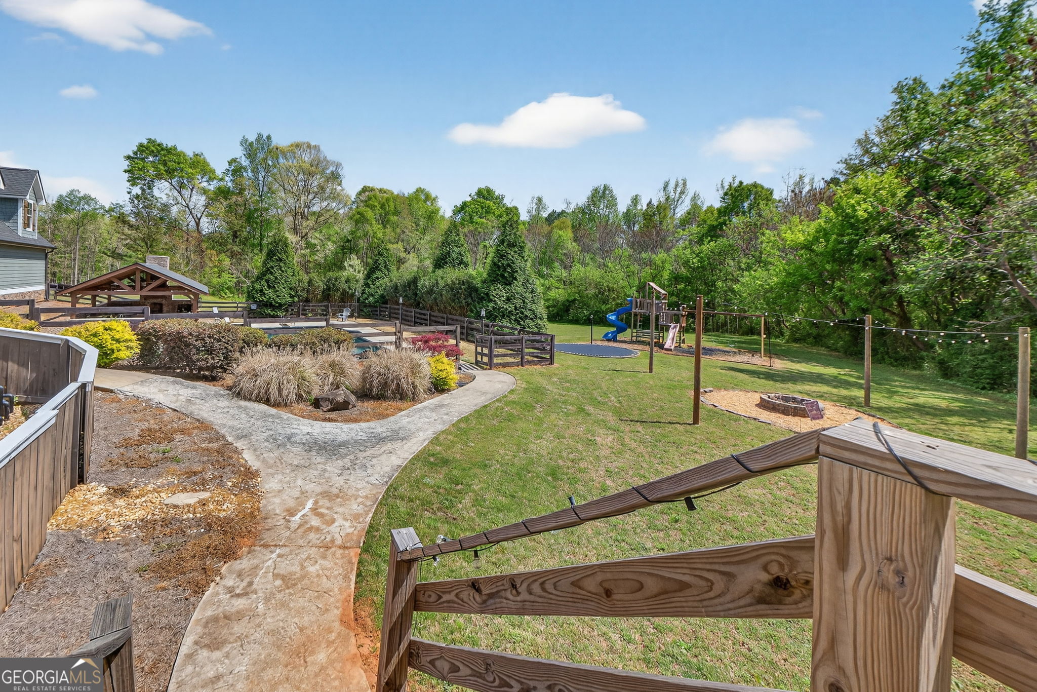 130 Derby Drive Forsyth, GA 31029 - Photo 8 of 97 a view of a backyard with swimming pool