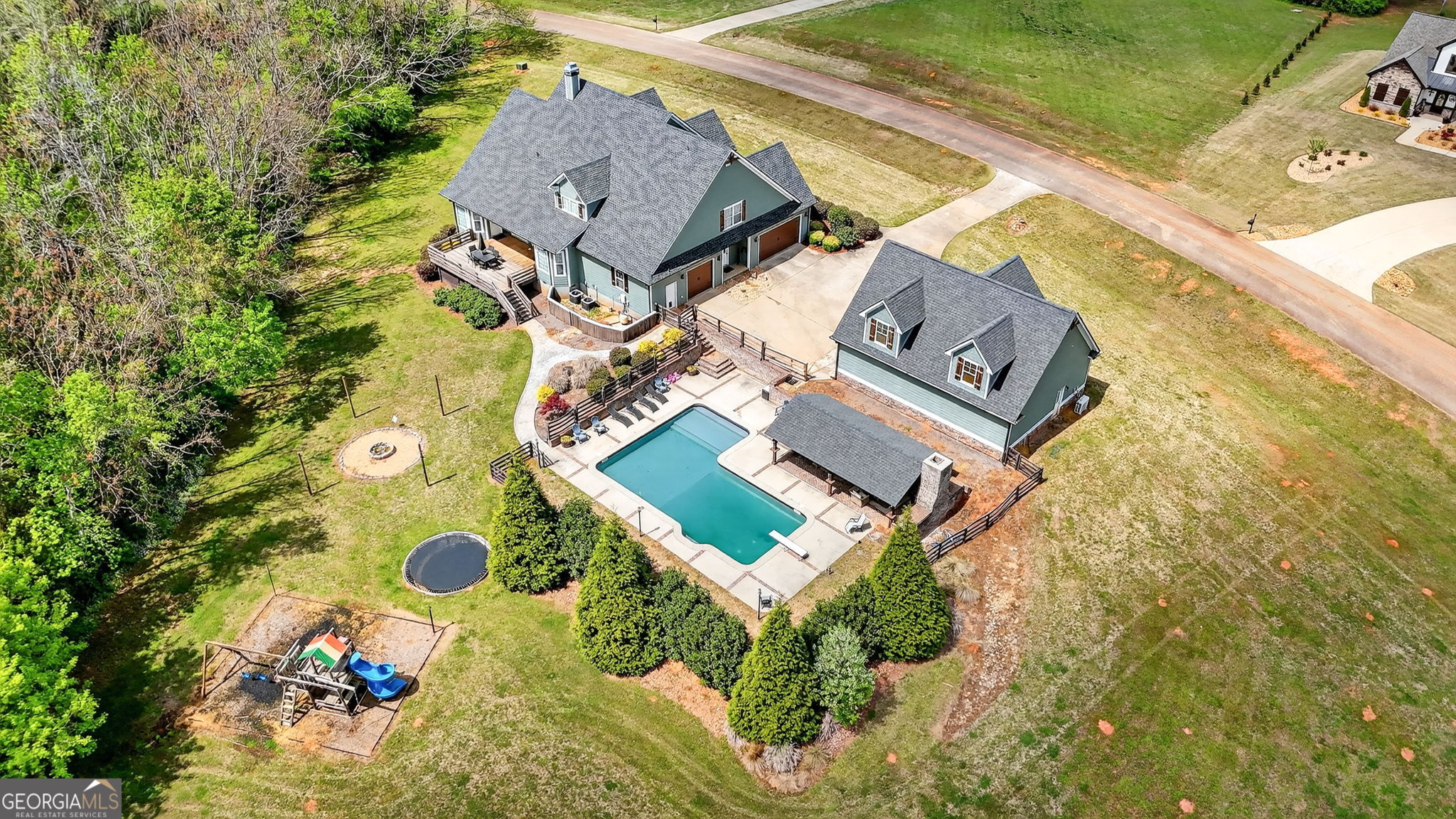 130 Derby Drive Forsyth, GA 31029 - Photo 86 of 97 an aerial view of a house with swimming pool and outdoor space