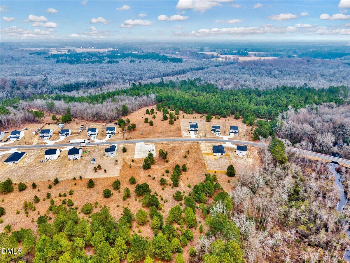 Lot 5 Blue Springs Road Red Springs, NC 28377 - Photo 9 of 9 a view of multiple houses with a yard