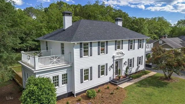 front view of a house with a yard