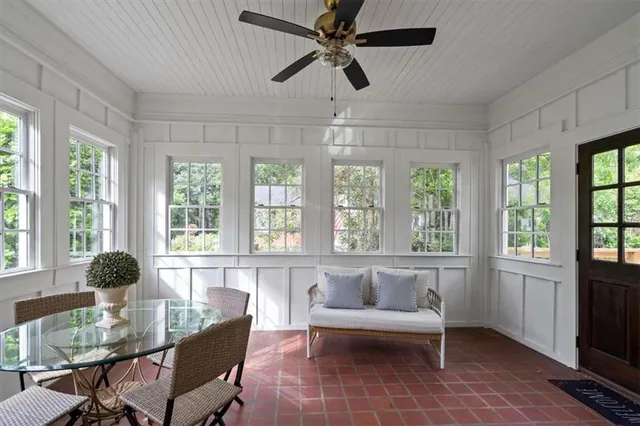 a kitchen that has a sink and cabinets