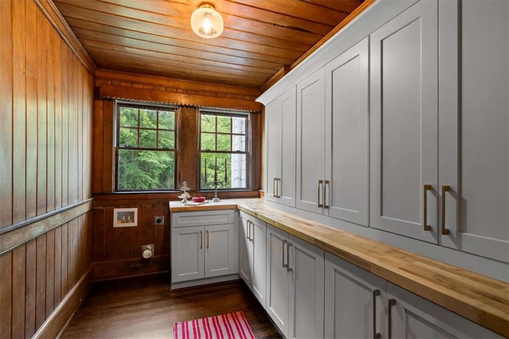 6104 Floyd Street Northeast Covington, GA 30014 - Photo 13 of 53 a kitchen that has a sink and cabinets