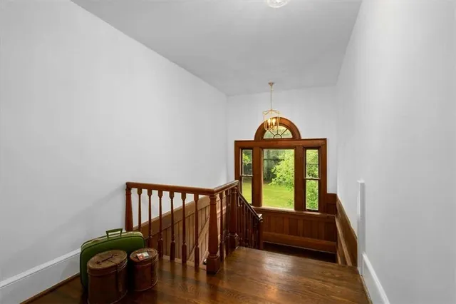 a bed room with a bed and a window