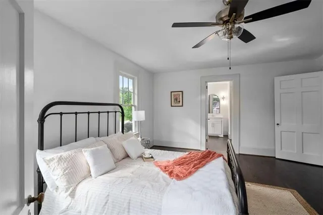 a bathroom with a double vanity sink and a with a mirror
