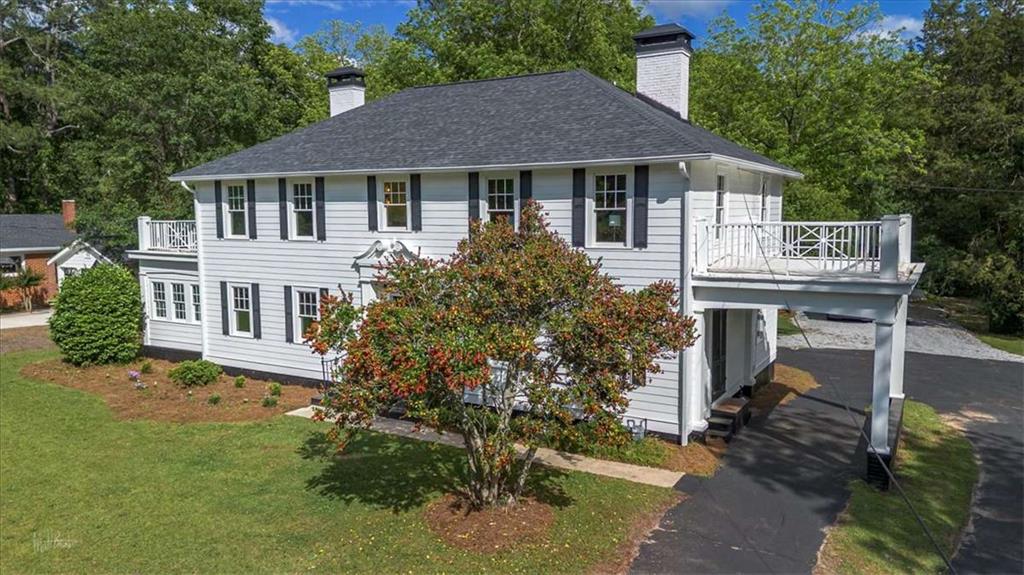 6104 Floyd Street Northeast Covington, GA 30014 - Photo 38 of 53 a house that has a tree in it