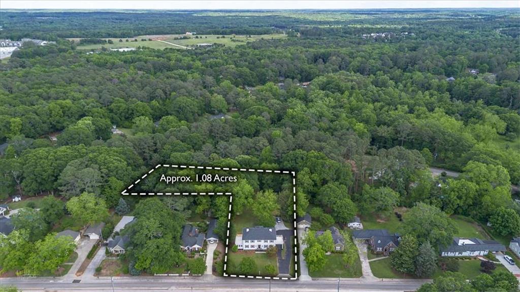 6104 Floyd Street Northeast Covington, GA 30014 - Photo 53 of 53 an aerial view of a city