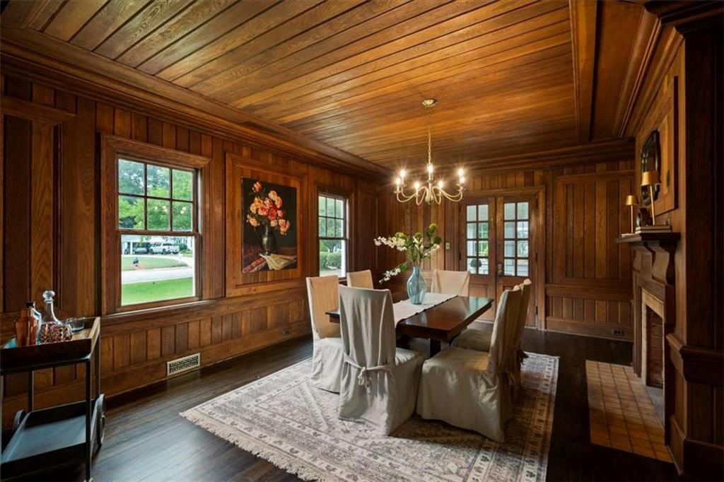 6104 Floyd Street Northeast Covington, GA 30014 - Photo 6 of 53 a view of a dining room with furniture window and wooden floor