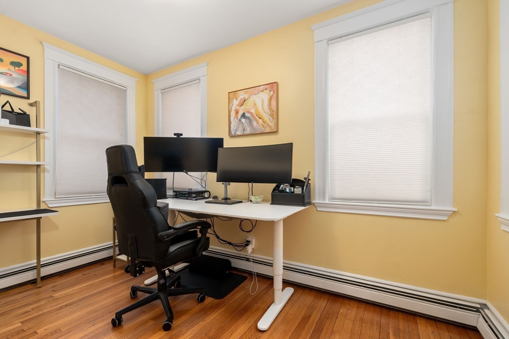7 Parkman Street, Unit 1 Brookline, MA 02446 - Photo 20 of 27 a view of a workspace with furniture and a window