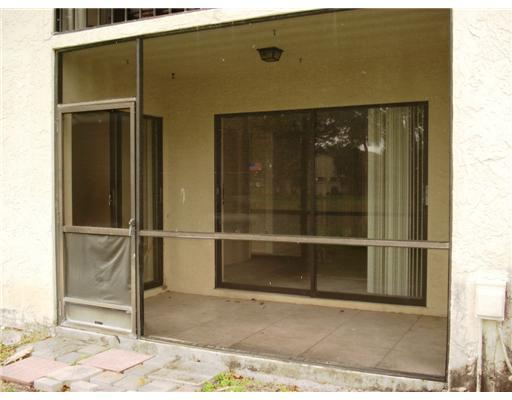 23466 Southwest 57th Avenue, Unit 5050 Boca Raton, FL 33428 - Photo 12 of 16 Patio/Deck