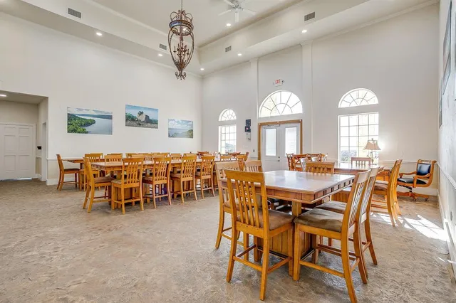 a view of a house with outdoor space and sitting area