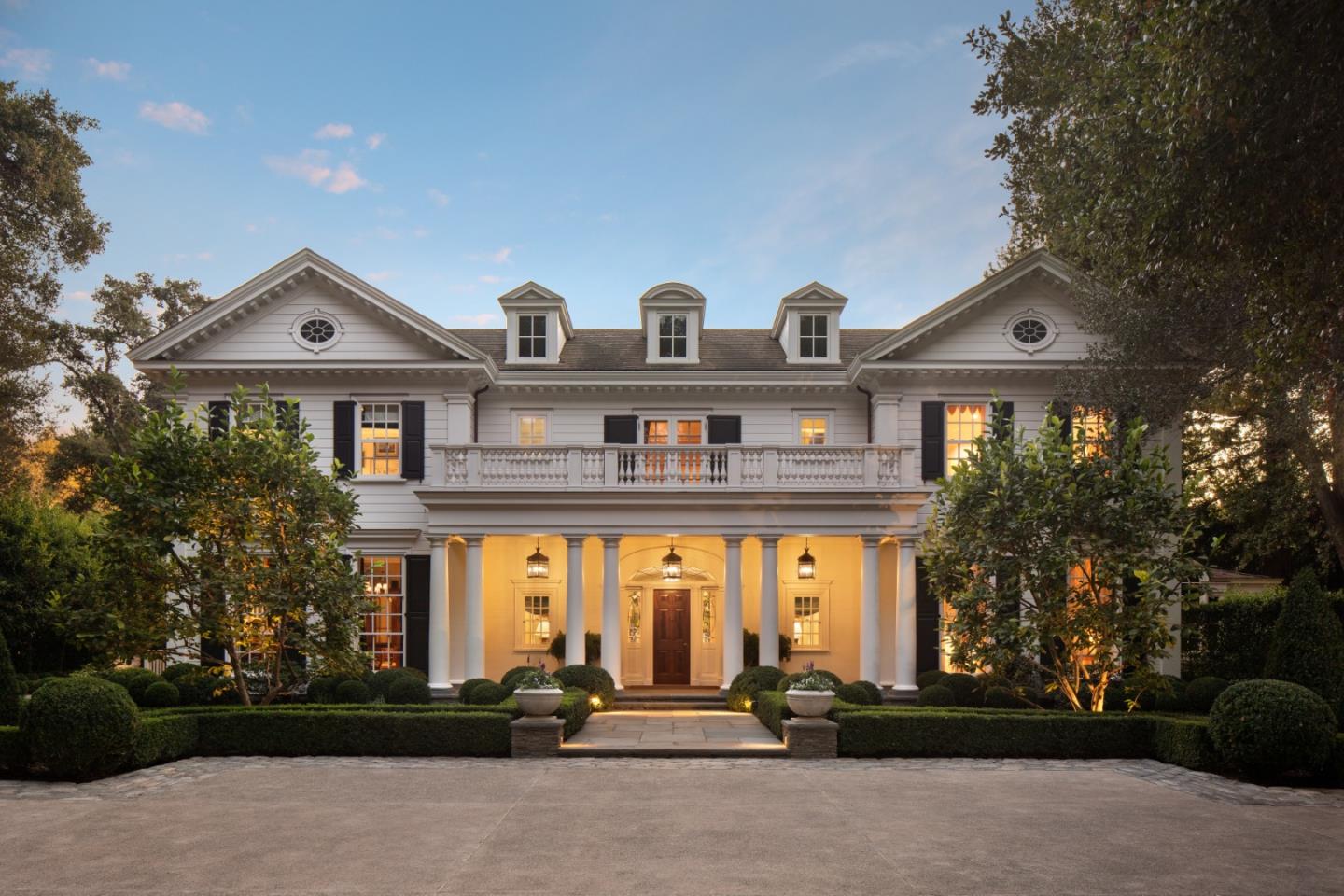 98 Stevenson Lane Atherton, CA 94027 - Photo 1 of 10 a front view of a house with lots of trees and plants