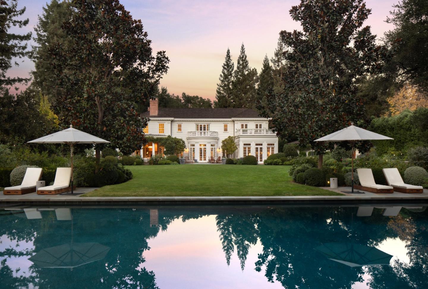 98 Stevenson Lane Atherton, CA 94027 - Photo 3 of 10 a view of a lake with house in the background