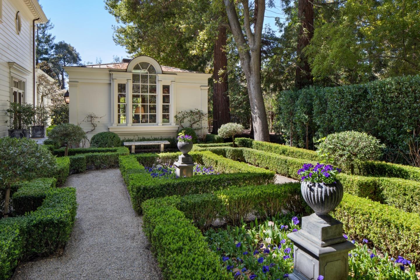 98 Stevenson Lane Atherton, CA 94027 - Photo 8 of 10 a front view of a house with fountain and garden