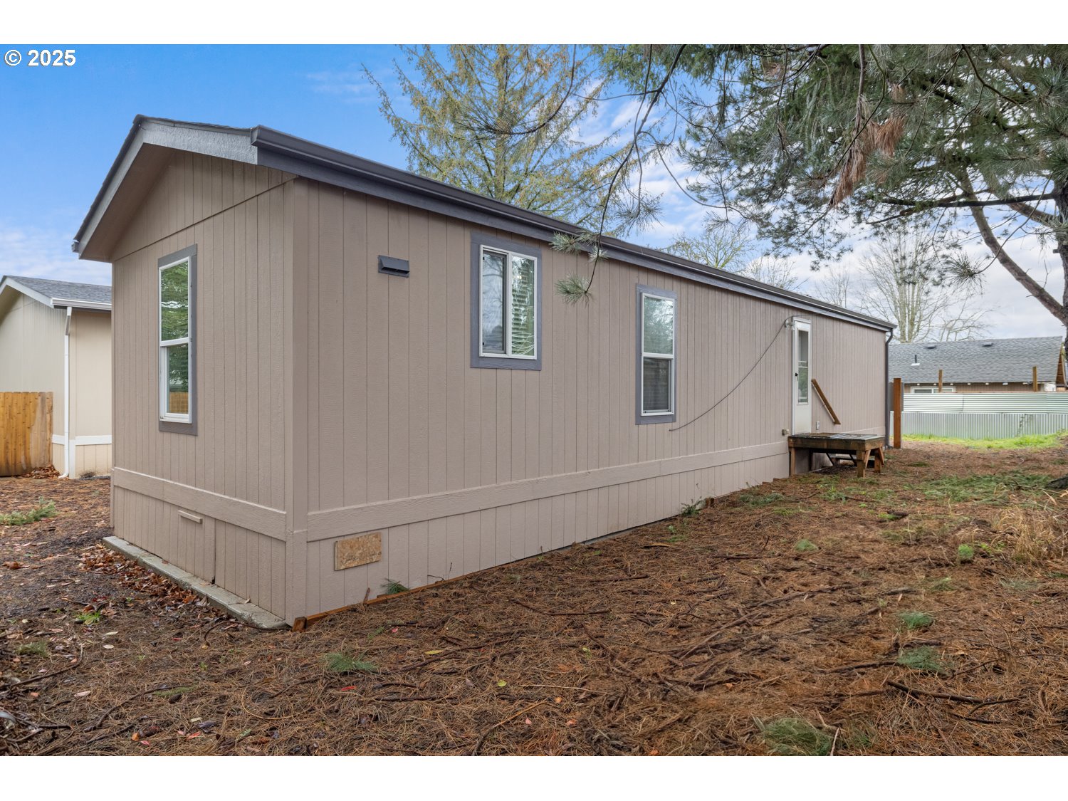 2696 Southeast Palmquist Road Gresham, OR 97080 - Photo 17 of 21 a house view with a backyard space