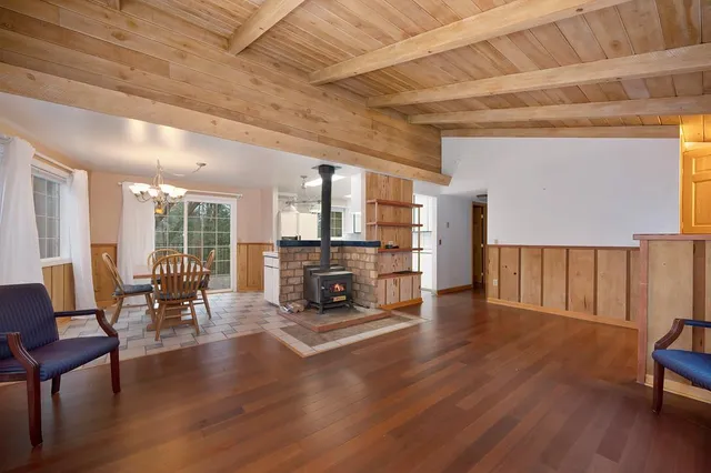 a kitchen with a stove and a refrigerator