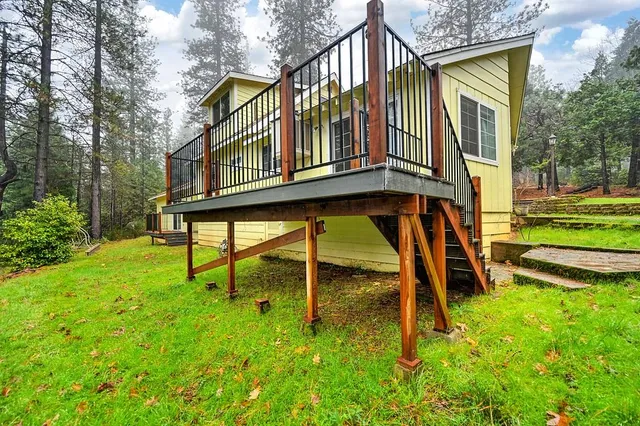 a house view with a garden space