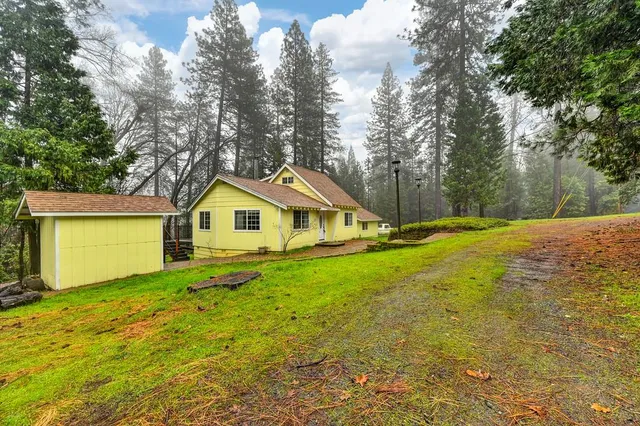 a house with trees in front of it