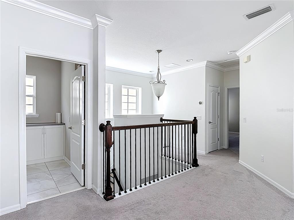1513 Resolute Street Celebration, FL 34747 - Photo 23 of 43 a view of a hallway with entryway door