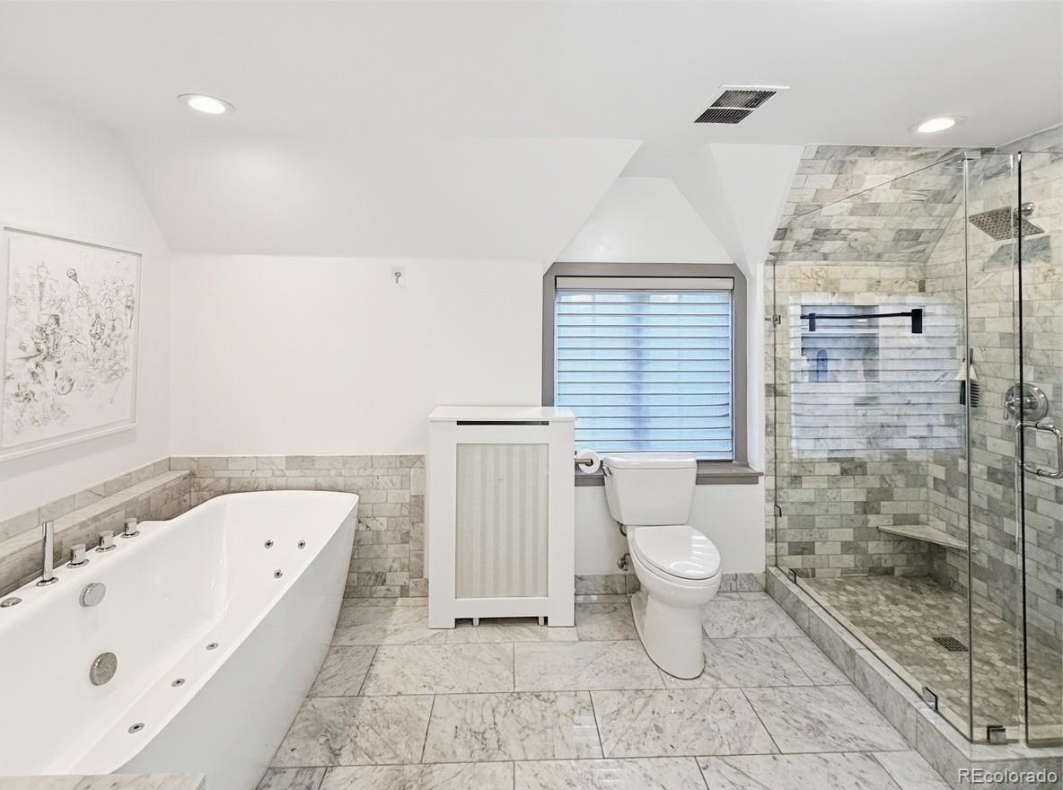 789 15th Street Boulder, CO 80302 - Photo 16 of 30 a bathroom with a toilet sink and shower