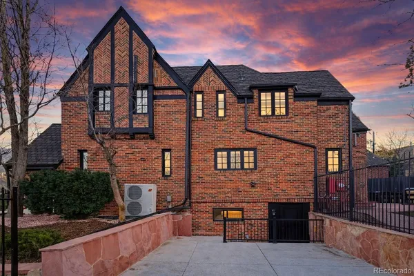 a front view of a house with glass windows