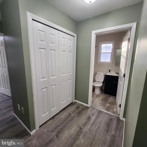 a bathroom with a shower and a toilet