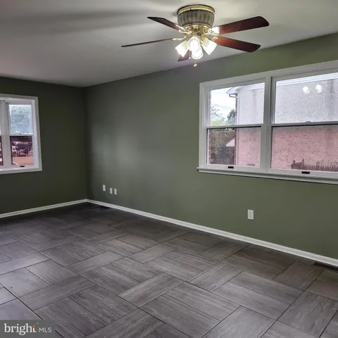 a view of a room with a large window