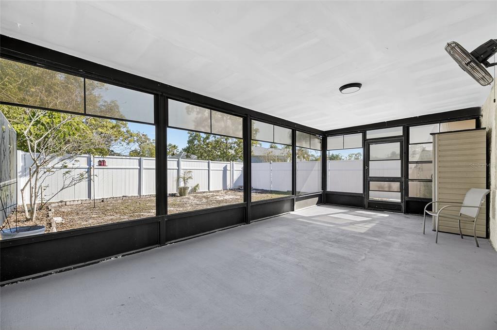 13035 Santee Street Spring Hill, FL 34609 - Photo 28 of 39 a view of an empty room with a large window