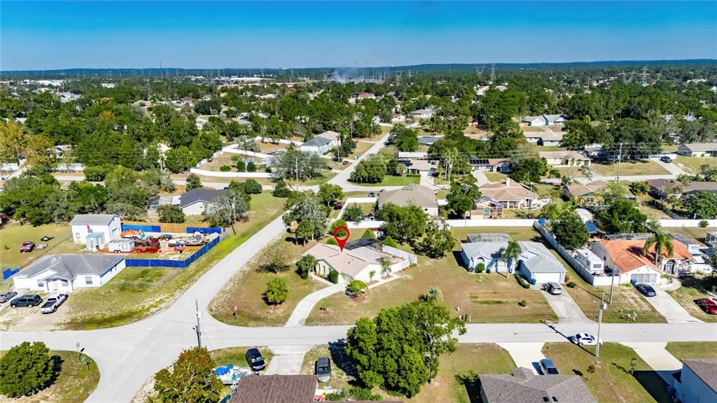 13035 Santee Street Spring Hill, FL 34609 - Photo 37 of 39 an aerial view of residential houses with outdoor space