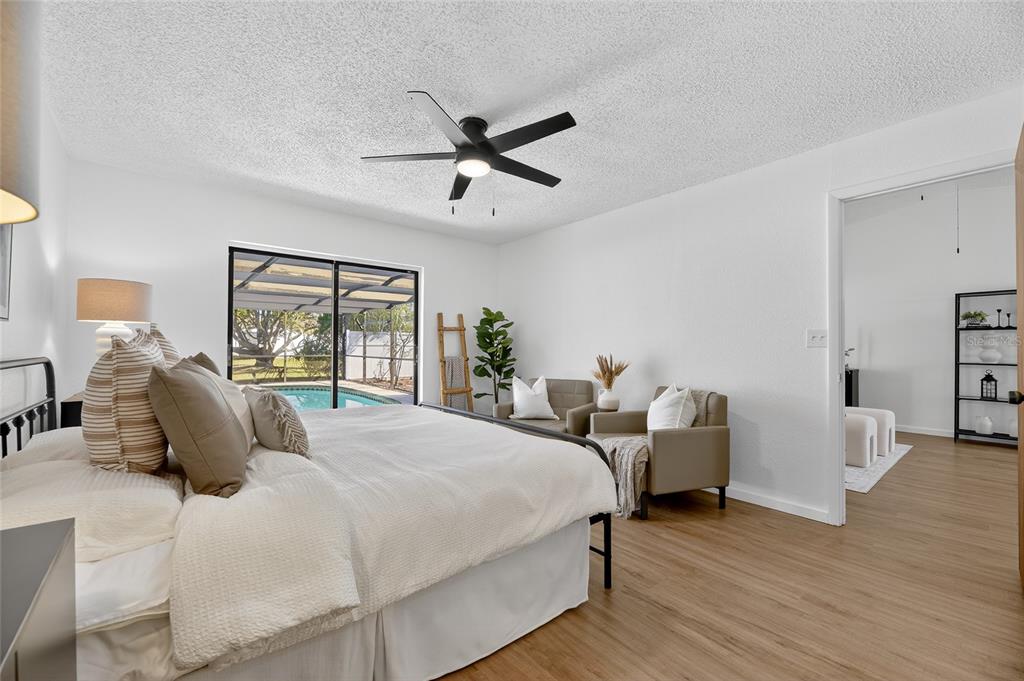 13035 Santee Street Spring Hill, FL 34609 - Photo 9 of 39 a bedroom with bed and window