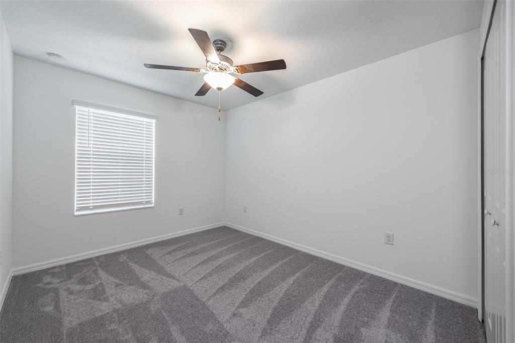 14348 Editors Note Street Ruskin, FL 33573 - Photo 14 of 29 a view of an empty room with a window