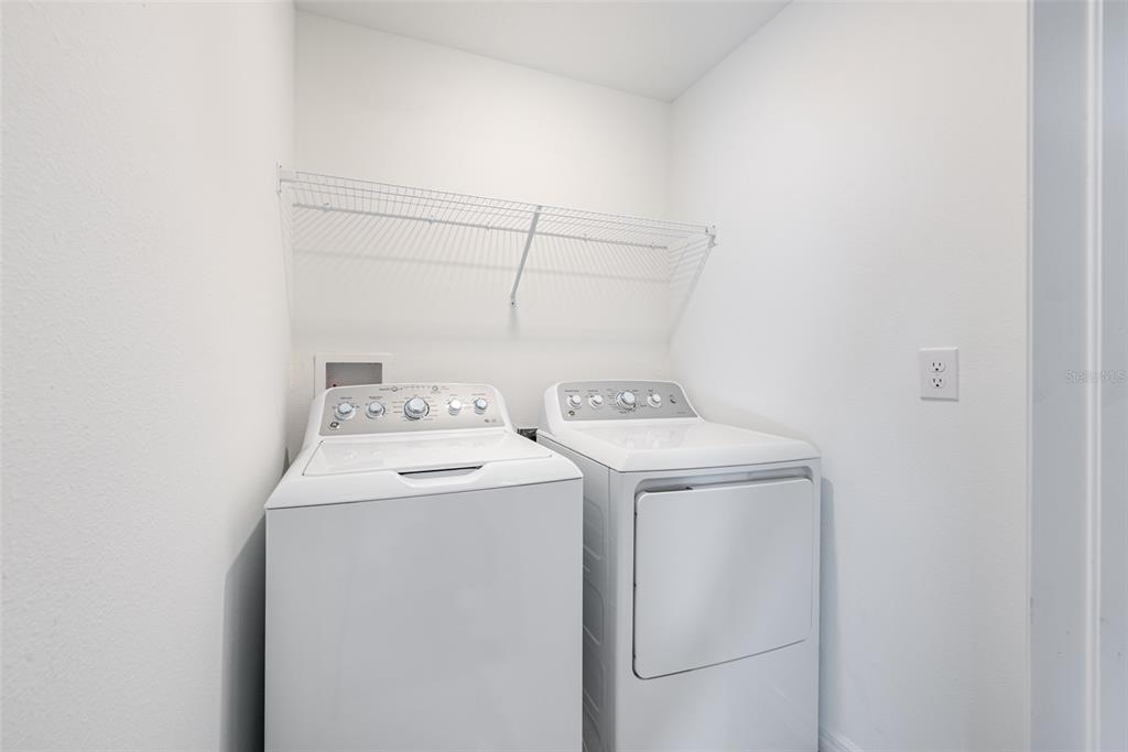 14348 Editors Note Street Ruskin, FL 33573 - Photo 17 of 29 a utility room with dryer and washer