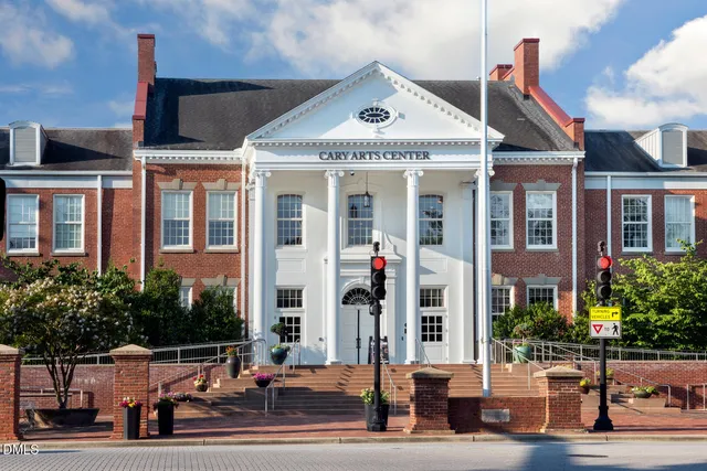 a view of a building with a street