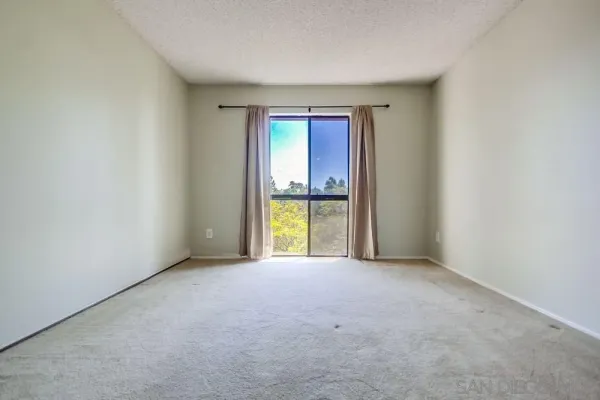 a view of a bathroom from a hallway