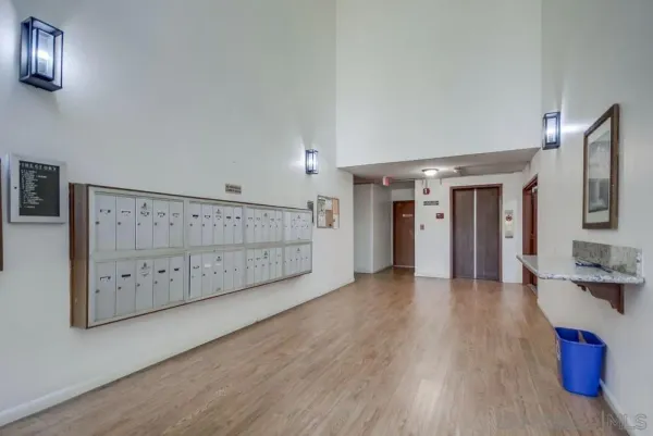 a yellow house with trees in front of it