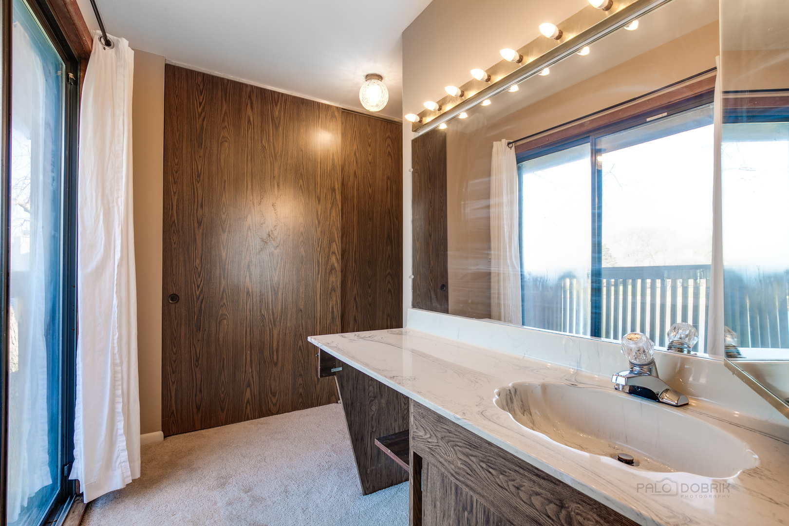663 Beth Court Gurnee, IL 60031 - Photo 18 of 26 a bathroom with a granite countertop sink and a large mirror