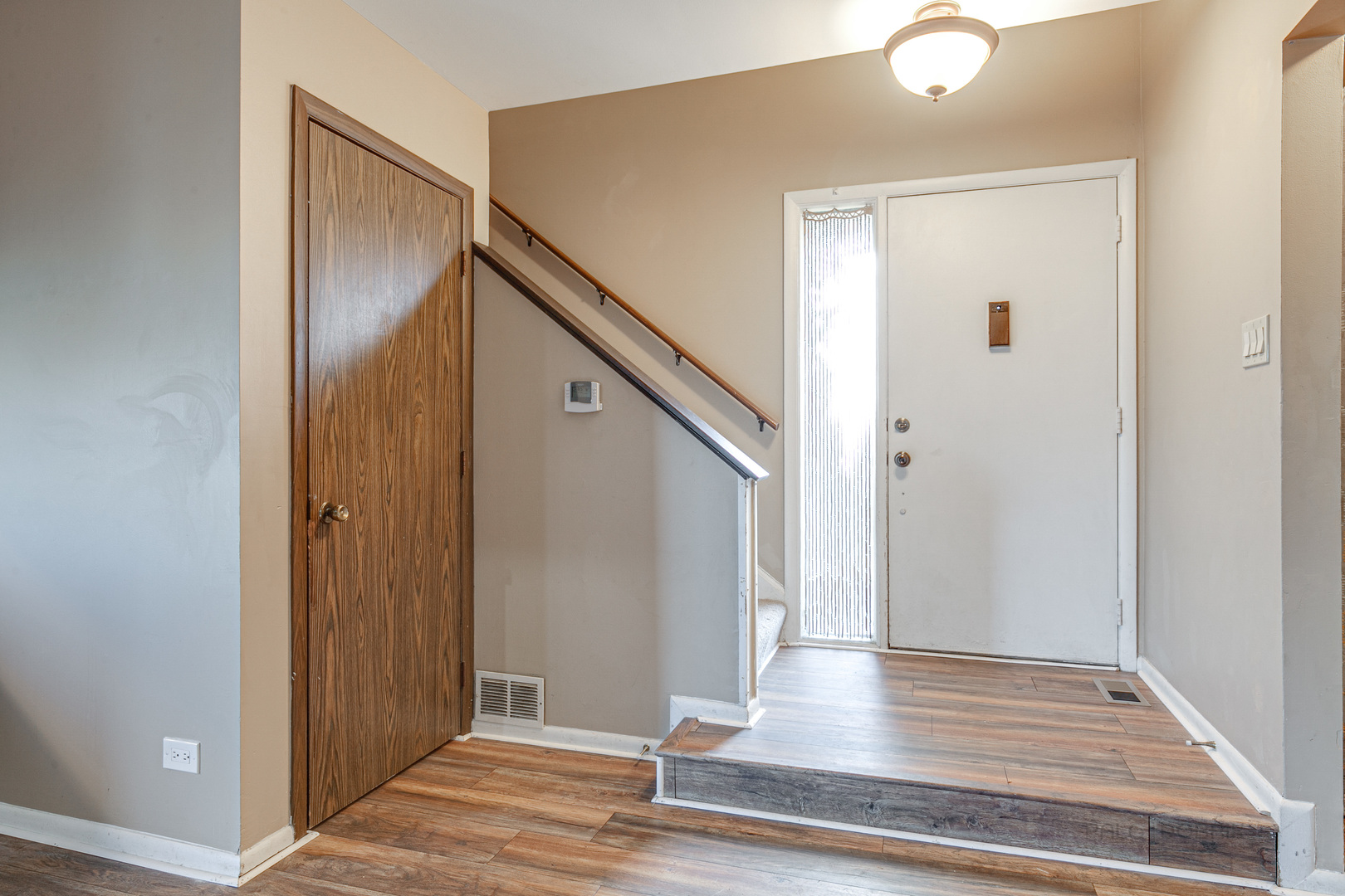 663 Beth Court Gurnee, IL 60031 - Photo 3 of 26 a view of livingroom with wooden floor