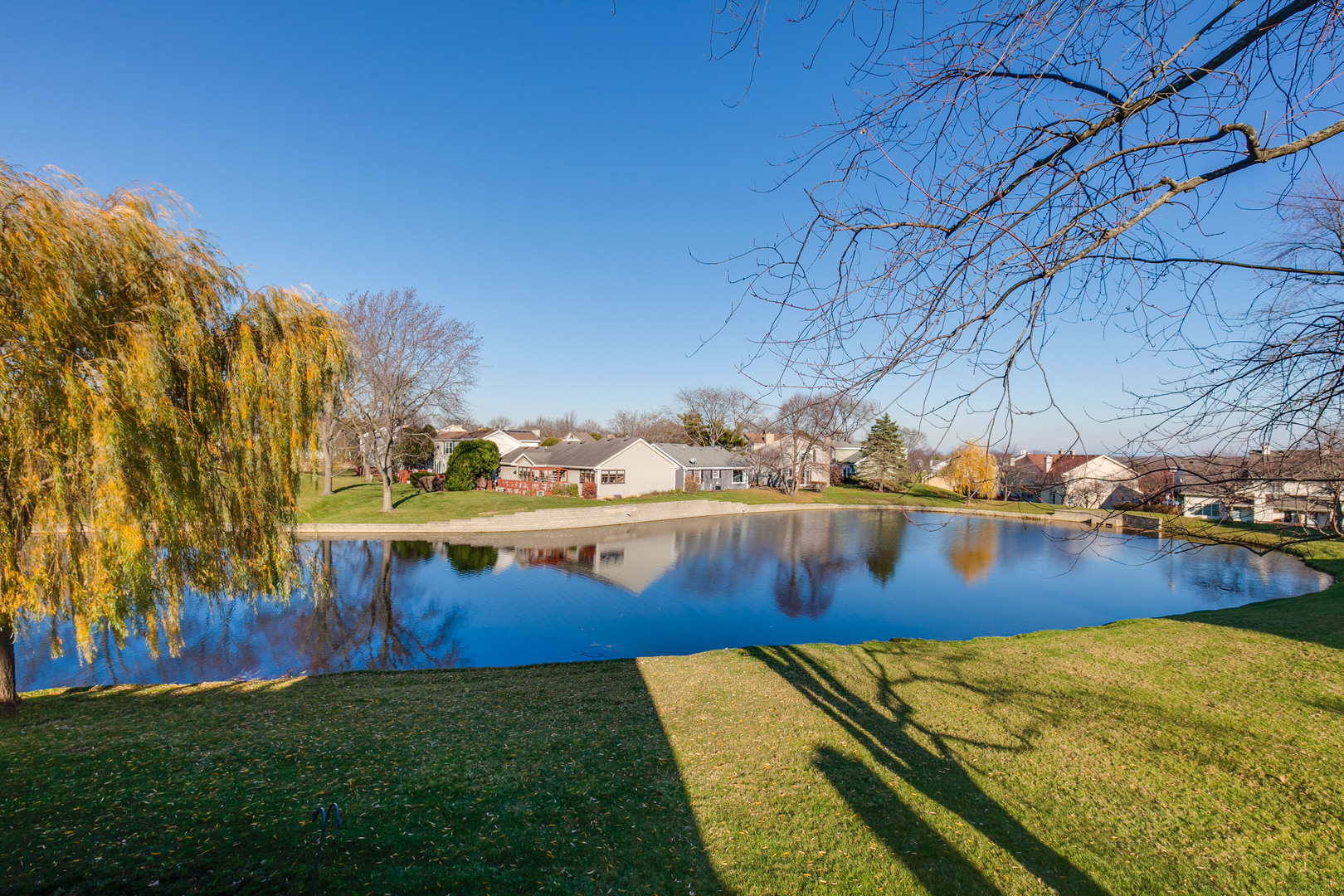 663 Beth Court Gurnee, IL 60031 - Photo 21 of 26 a view of a lake with houses