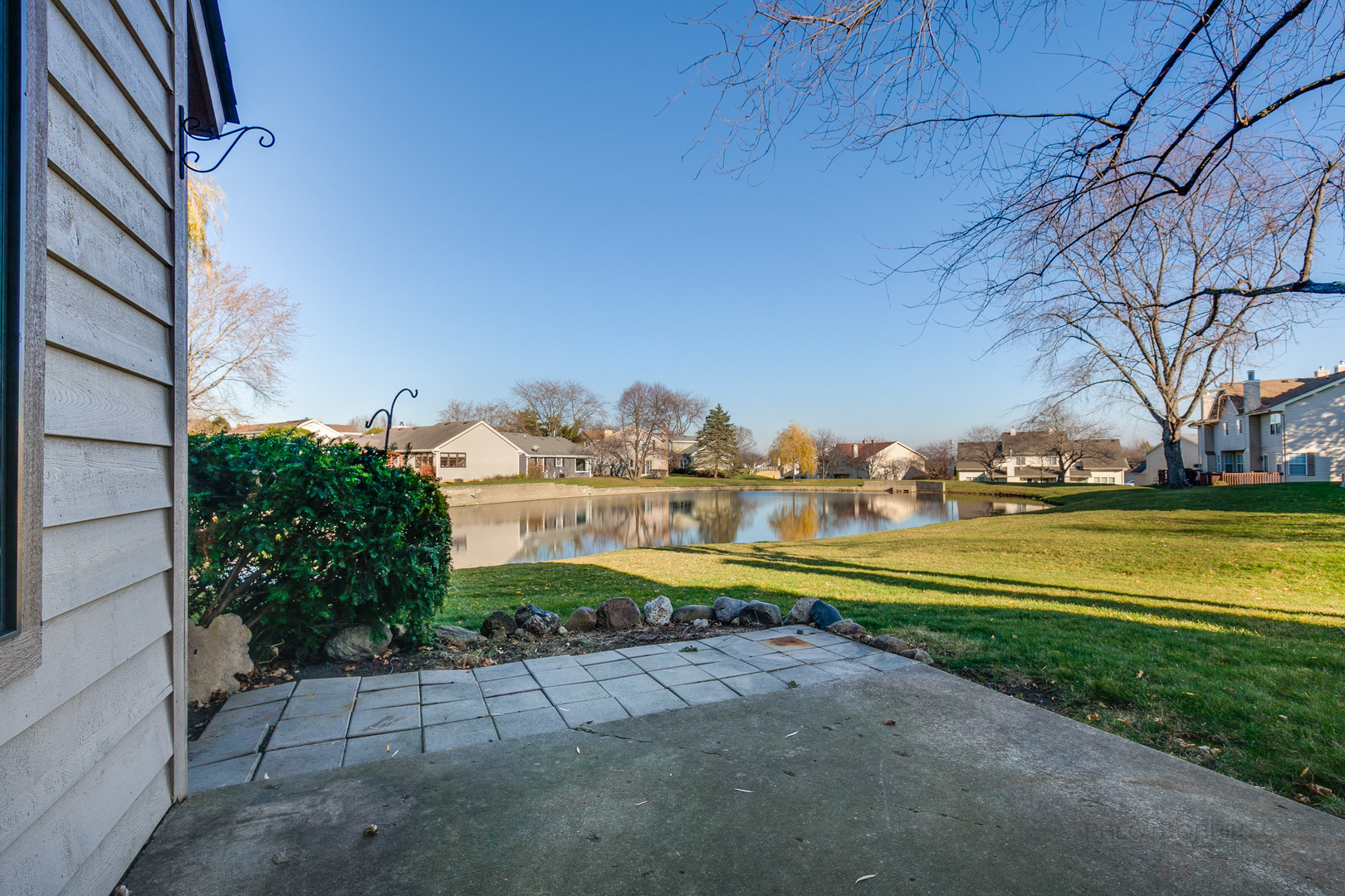663 Beth Court Gurnee, IL 60031 - Photo 22 of 26 a view of an ocean with a building in the background