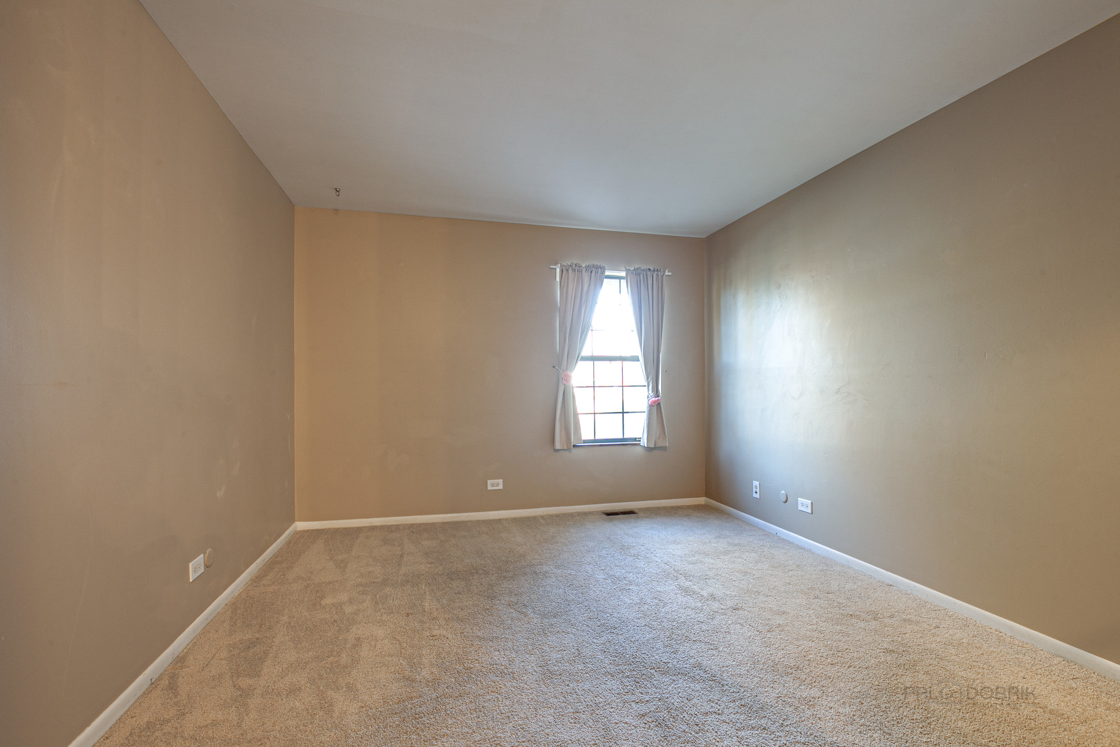 663 Beth Court Gurnee, IL 60031 - Photo 10 of 26 a view of an empty room with a window