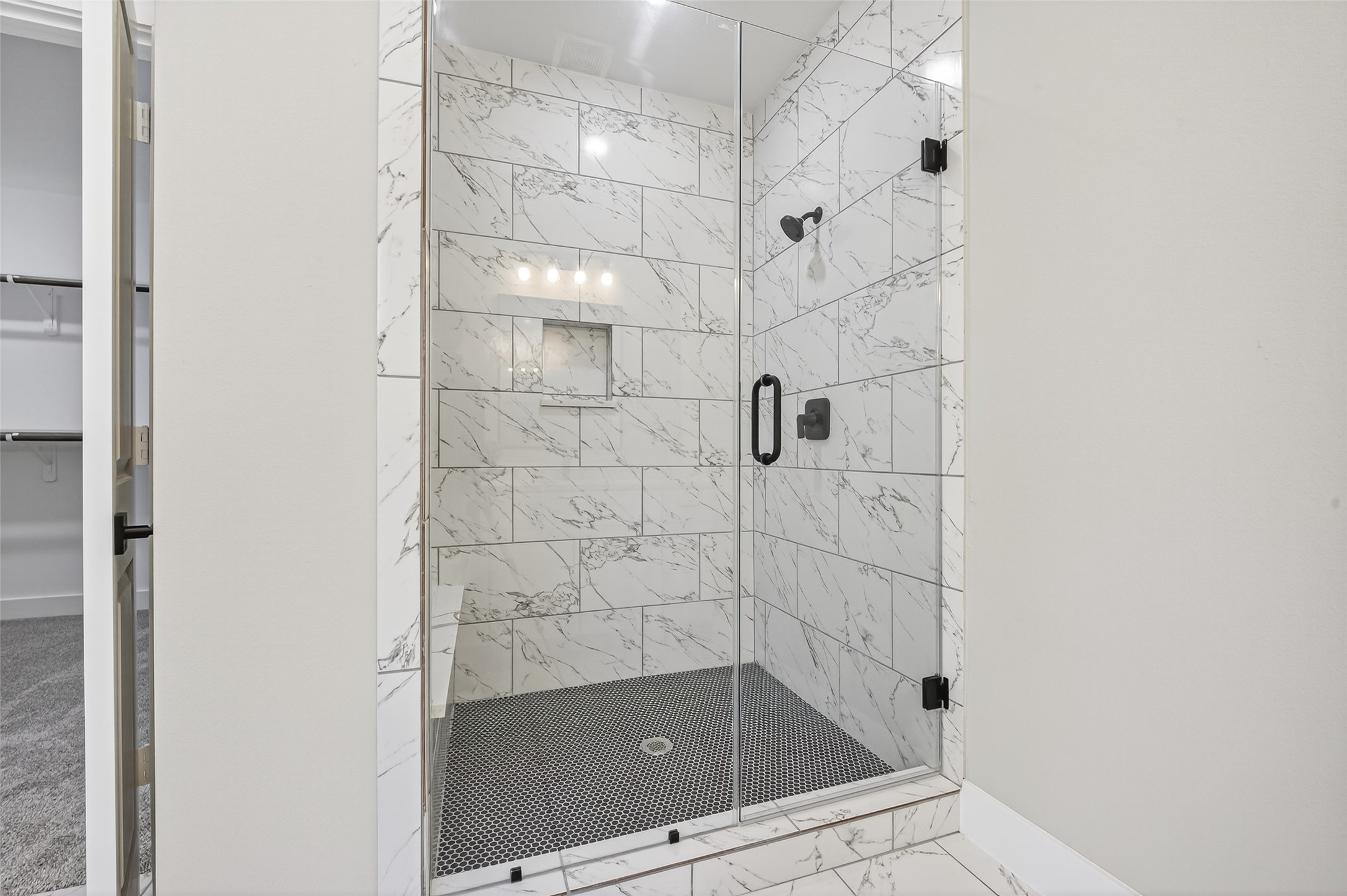 4906 Wunder Way Houston, TX 77069 - Photo 23 of 44 a bathroom with a shower