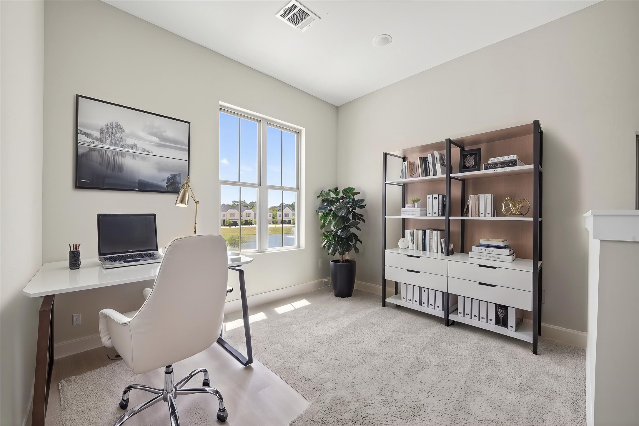 4906 Wunder Way Houston, TX 77069 - Photo 28 of 44 a view of a workspace with furniture and a window