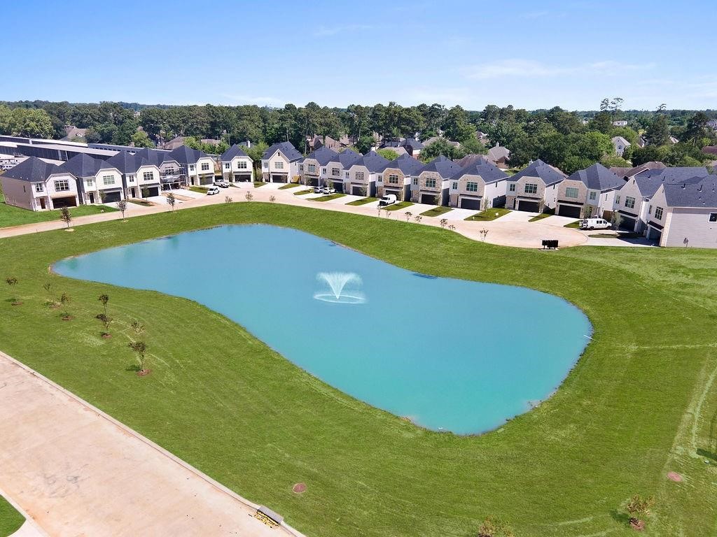 4906 Wunder Way Houston, TX 77069 - Photo 40 of 44 a view of a swimming pool with a garden