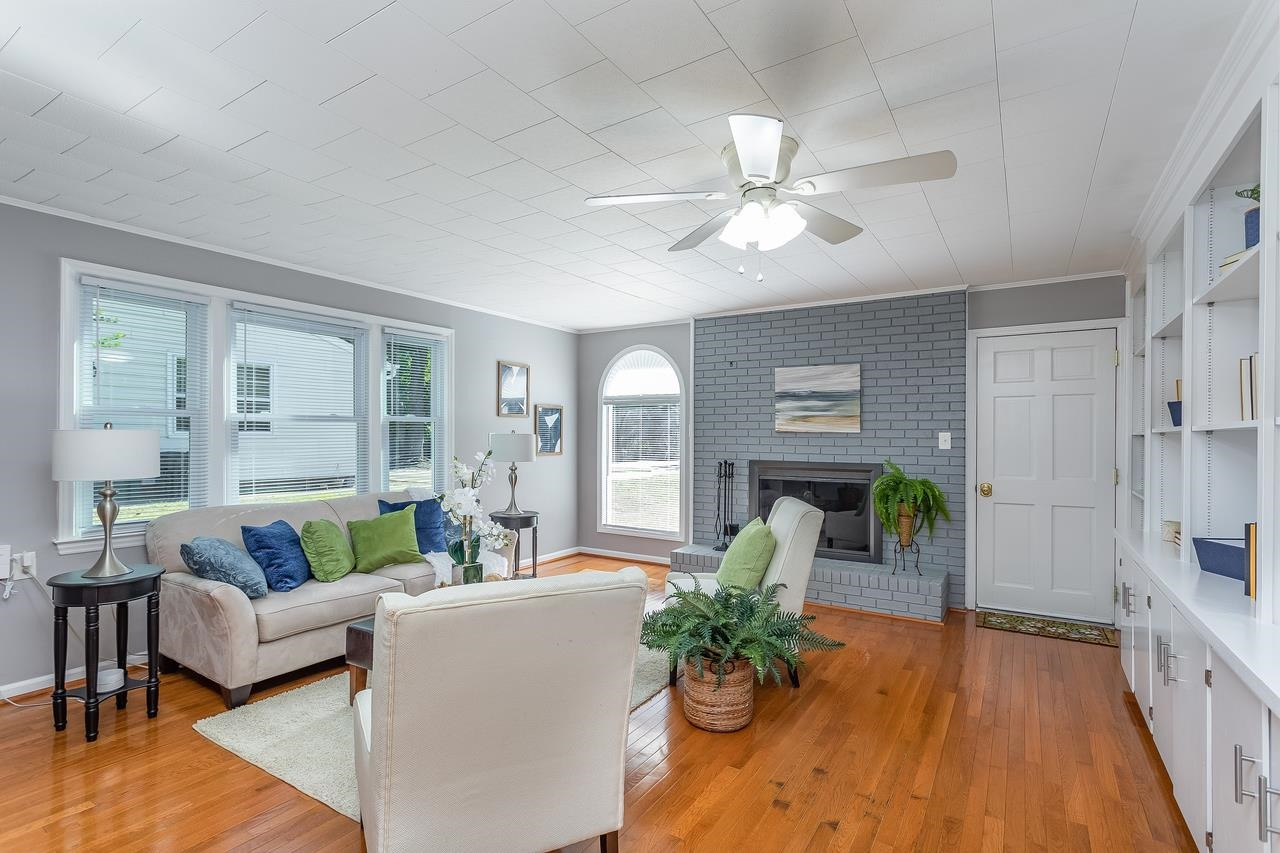 5104 Newcastle Road Raleigh, NC 27606 - Photo 13 of 26 Family Room with Fireplace