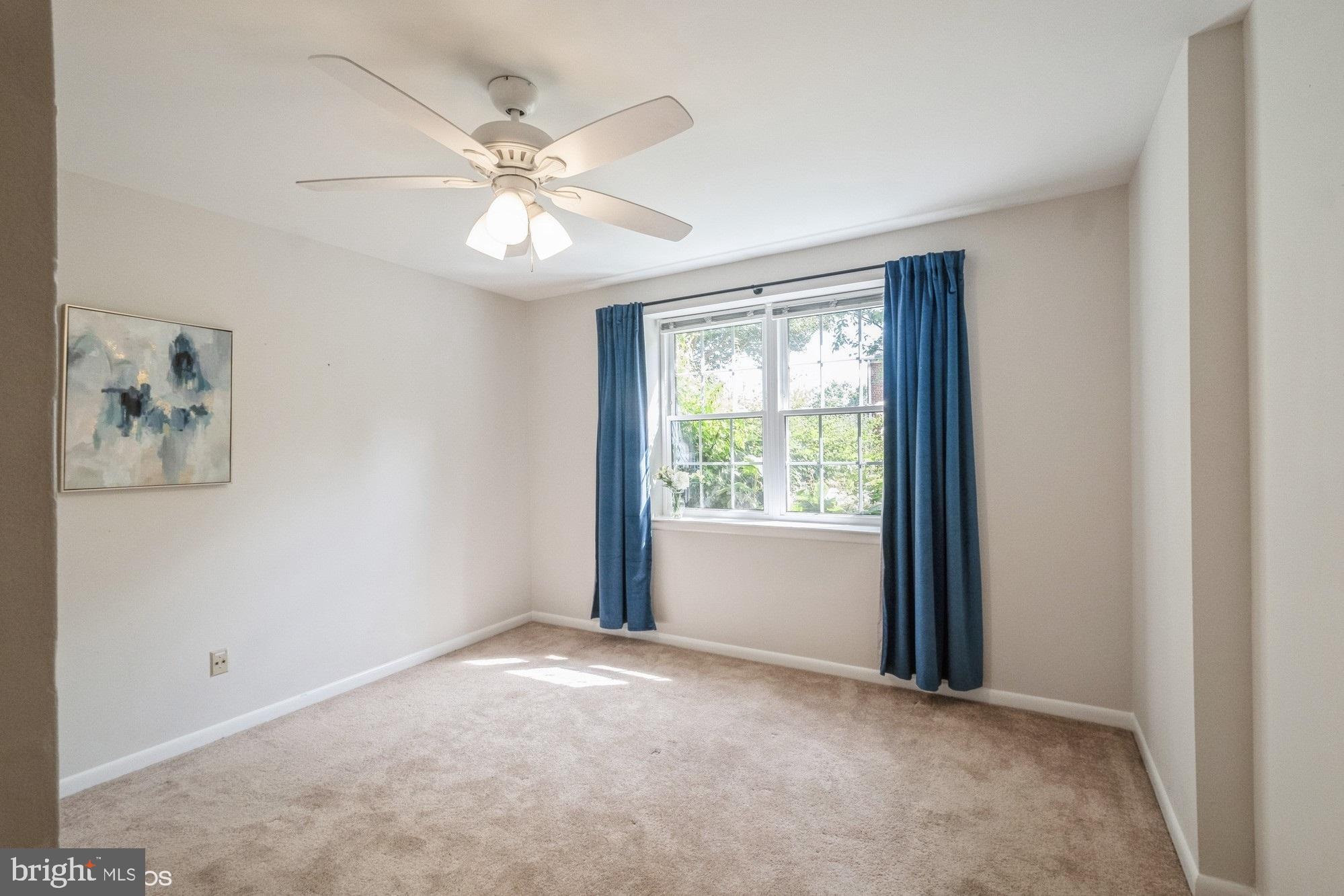 4646 28th Road South, Unit A Arlington, VA 22206 - Photo 22 of 38 Primary bedroom with a double window & ceiling fan