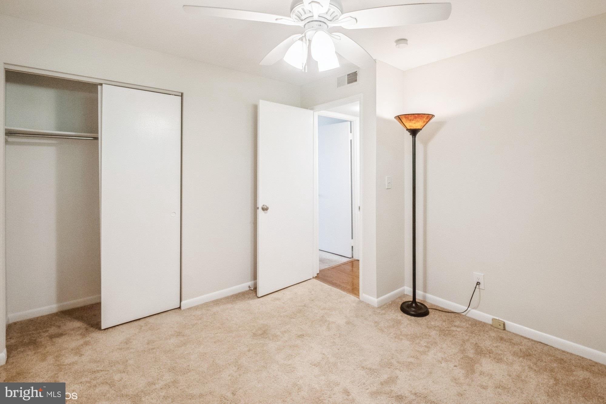 4646 28th Road South, Unit A Arlington, VA 22206 - Photo 27 of 38 Closet and large ceiling fan in the second bedroom
