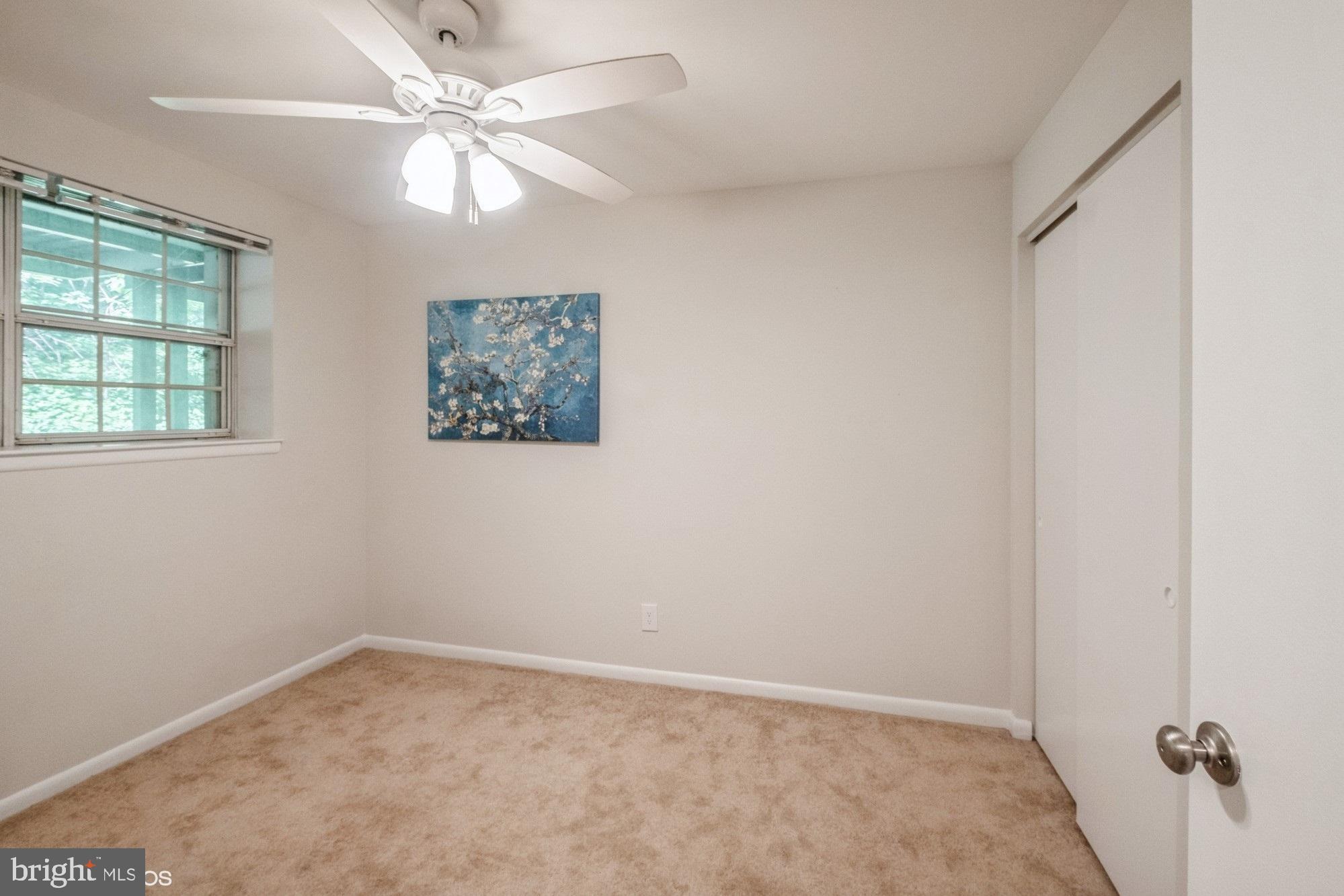 4646 28th Road South, Unit A Arlington, VA 22206 - Photo 28 of 38 2nd bedroom faces the treed area behind the condo