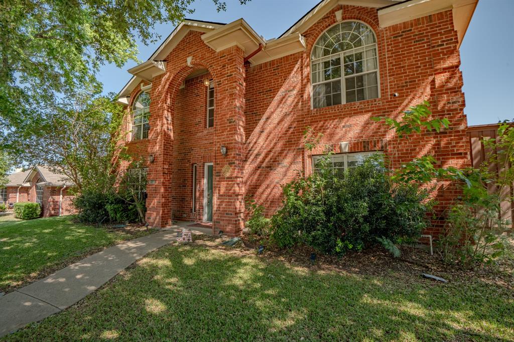 921 Carnegie Court Allen, TX 75002 - Photo 2 of 33 front view of a house with a yard