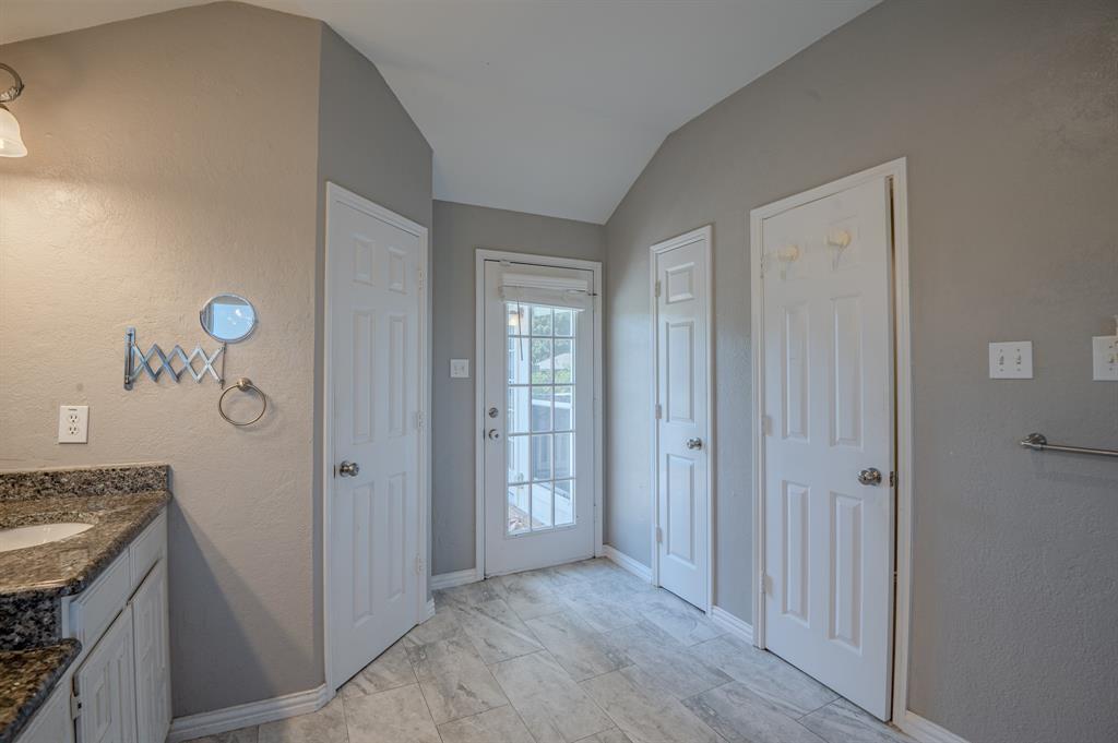 921 Carnegie Court Allen, TX 75002 - Photo 27 of 33 a view of a kitchen from the hallway