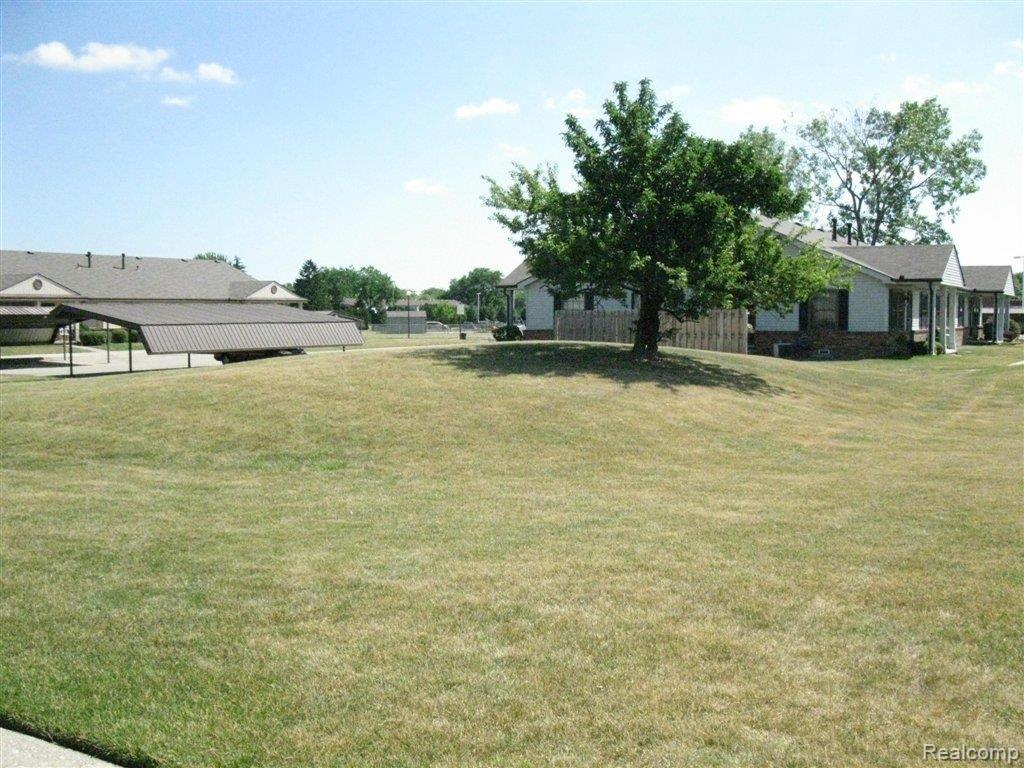 24476 Greenhill Road, Unit 4 Warren, MI 48091 - Photo 5 of 12 Open Spaces.JPG