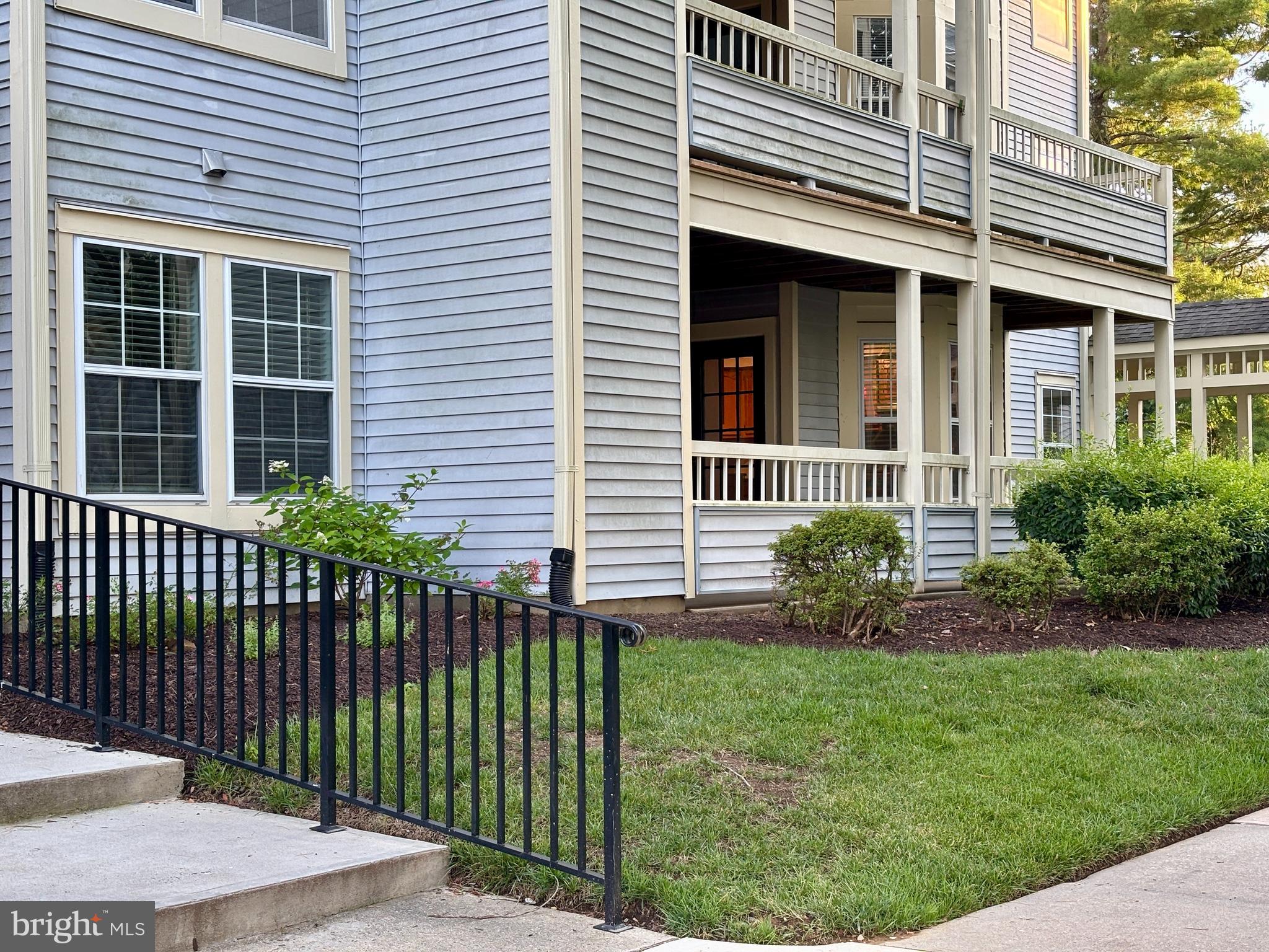 307 Trinity Court, Unit 4 Princeton, NJ 08540 - Photo 2 of 39 a front view of a house with a garden
